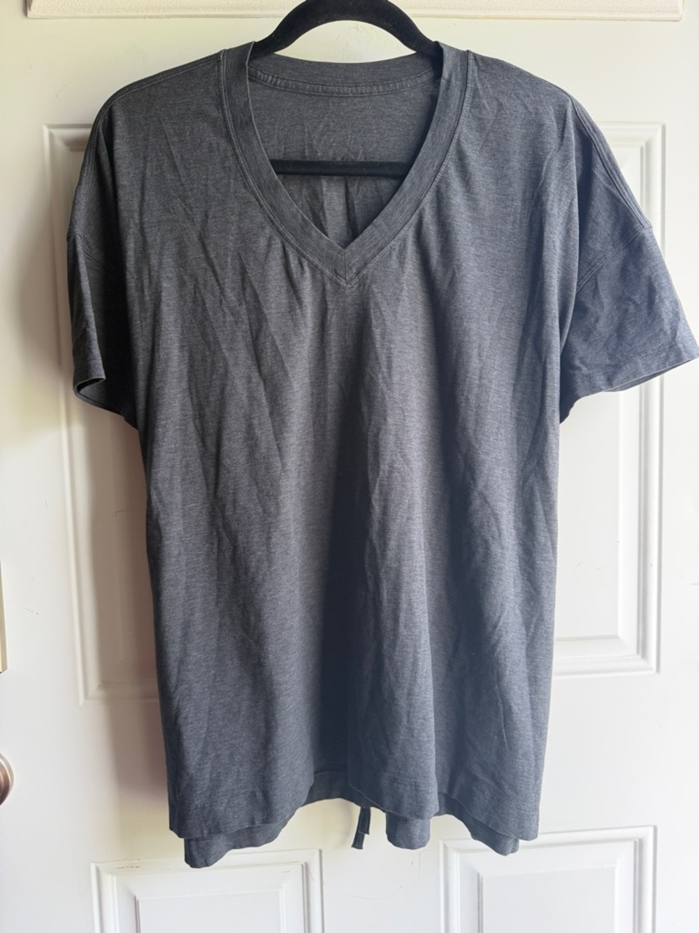 Lululemon heathered black/gray oversized V-neck tie back shirt.  Size 8/10.